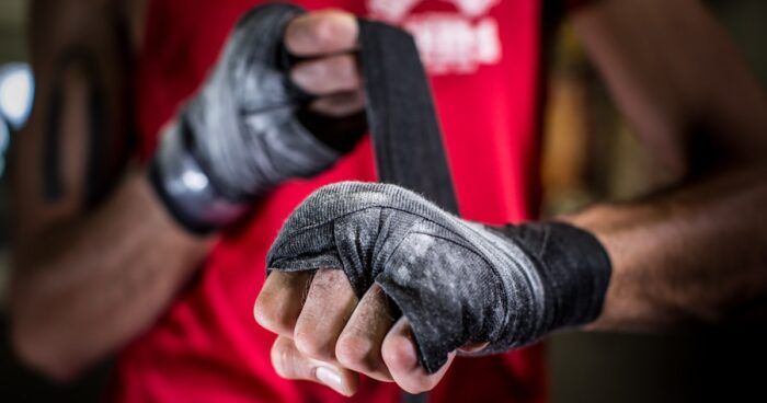 MMA fighter wrapping his hands